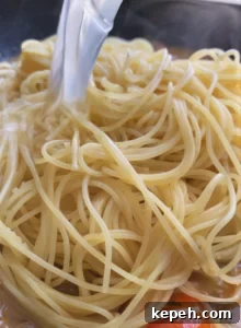 Garlic Butter and White Wine Seafood Pasta 12 Toss pasta in sauce