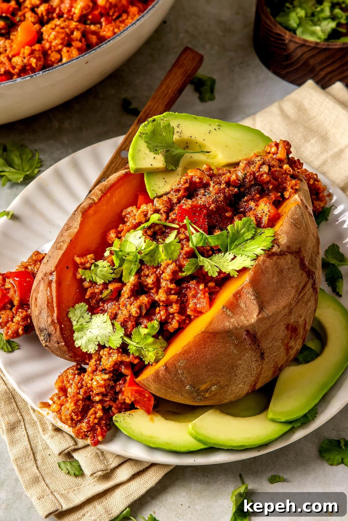 Chipotle Chorizo Stuffed Sweet Potatoes - Olivia Adriance