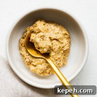 A bowl of Dijon mustard made from ground mustard seeds, white wine vinegar and salt.