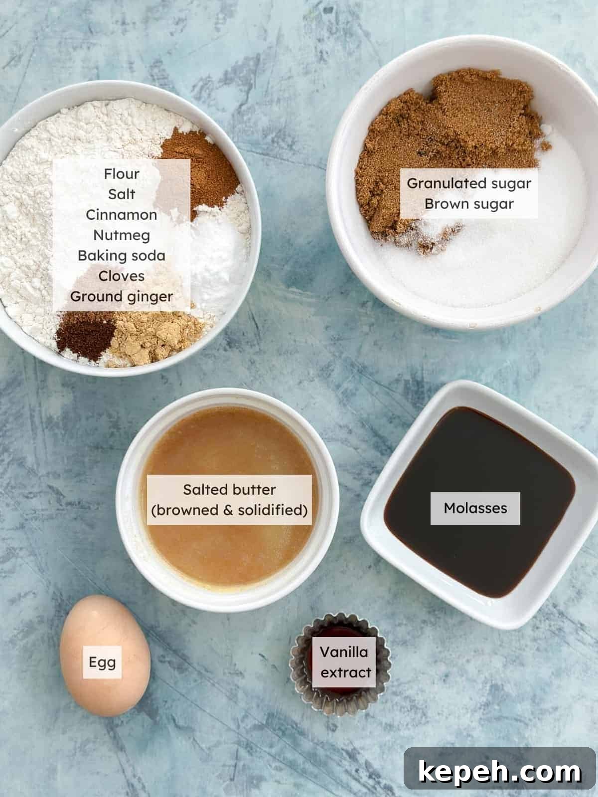 All of the ingredients needed to make Molasses Crinkle cookies.