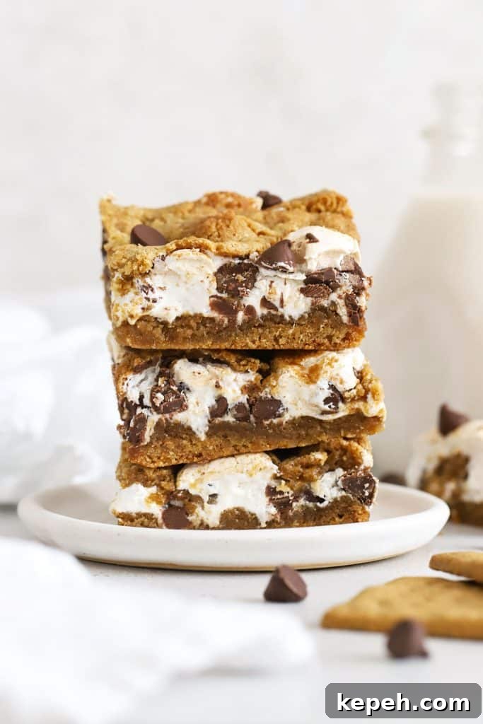 Fudgy Gluten-Free Brookies: Brownie Cookie Bars 11 gluten-free s'mores bars stacked on a plate