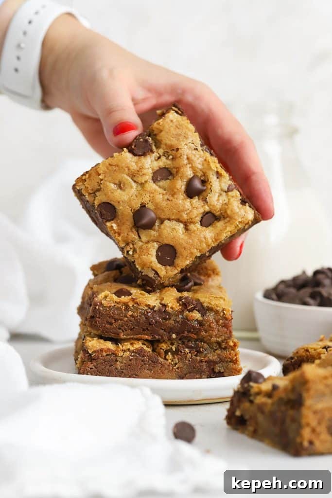 Fudgy Gluten-Free Brookies: Brownie Cookie Bars 8 gluten-free chocolate chip blondie bars in a stack