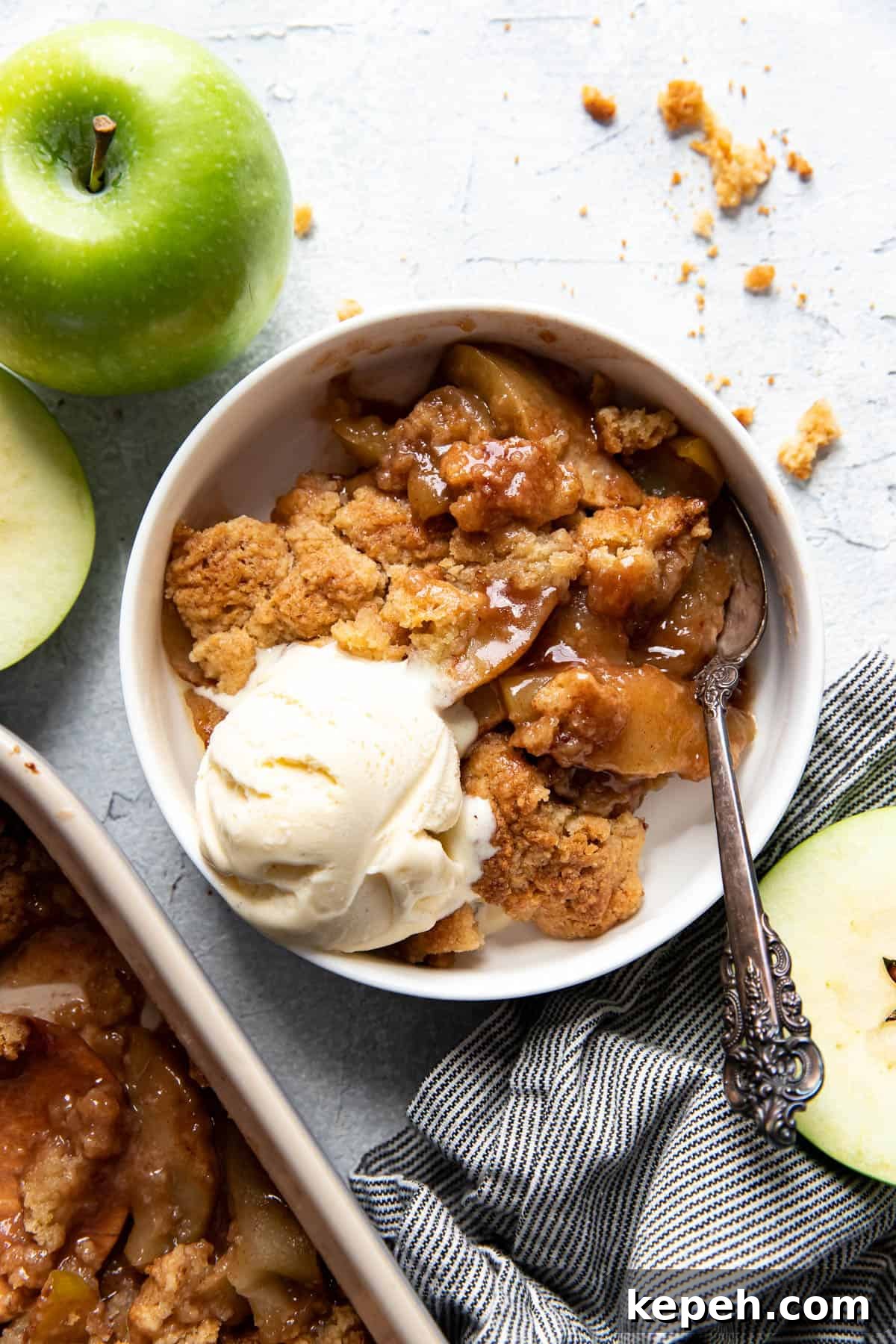 Classic Homemade Apple Cobbler with Cinnamon Crumble 4 apple cobbler in a bowl.