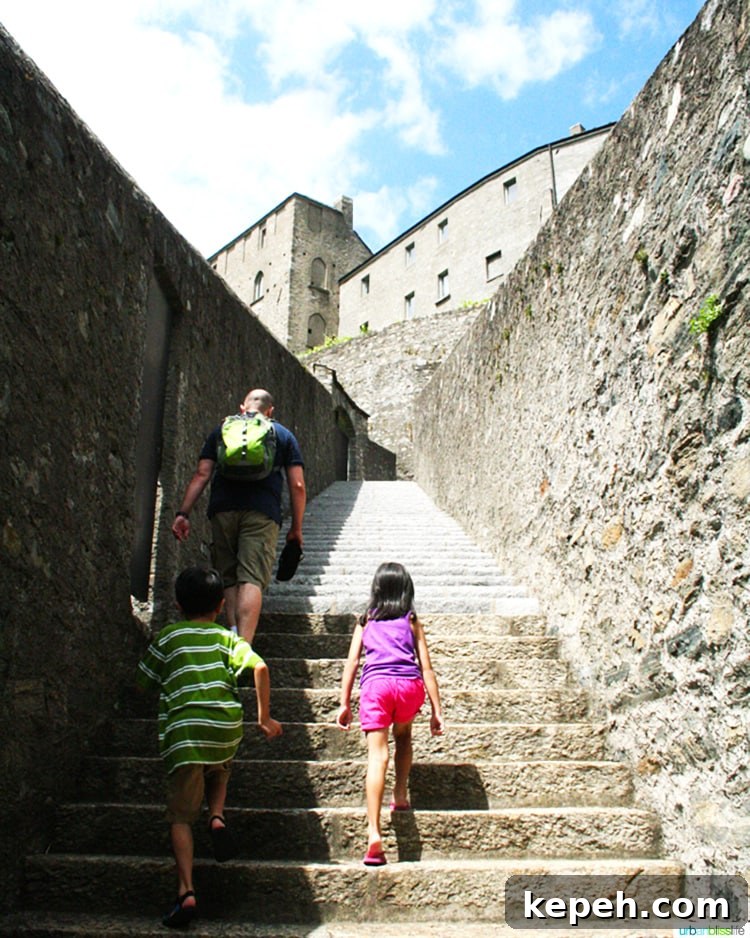 walking up steep steps to the Castles of Bellinzona 